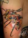 bee arm tattoo